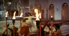 Just before her collapse, Pakeezah dances among the flames, burning in her own despair.